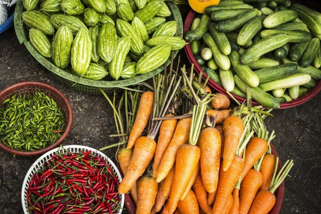 Fresh vegetables in market baskets